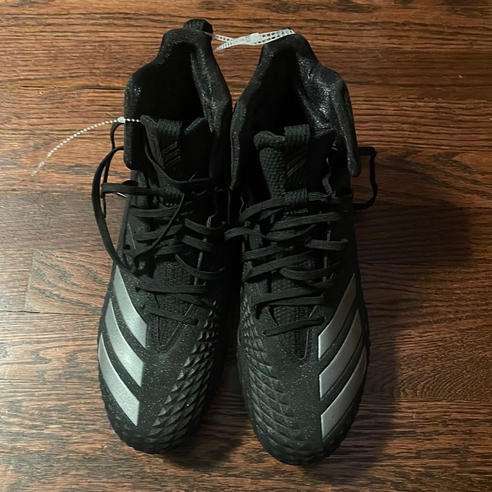 New. Size 11, black, adidas freak carbon x football cleats